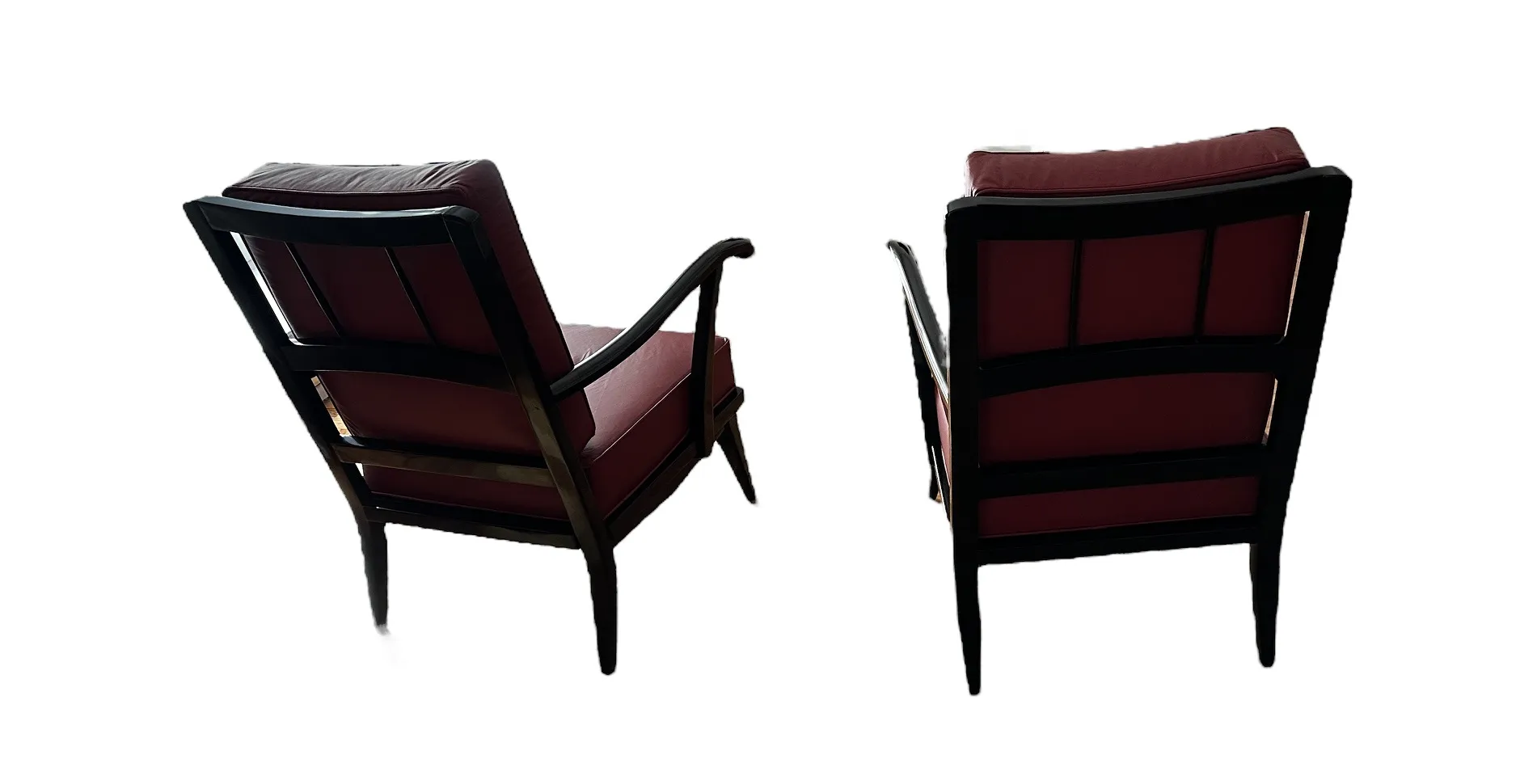 two antique armchairs with classic design in a cozy setting