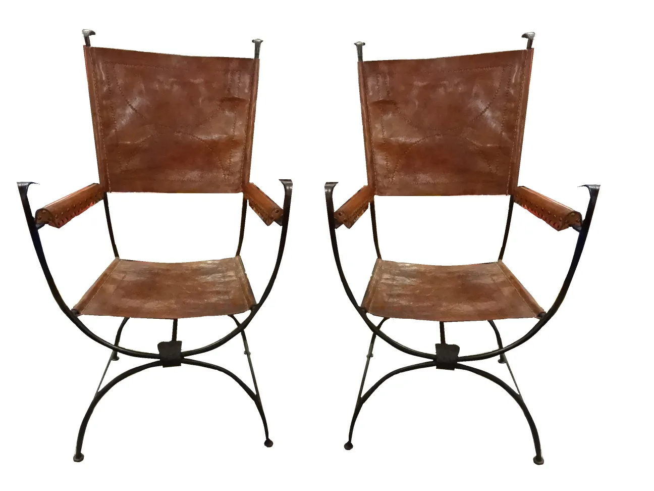 two antique armchairs with visible structure and brown tone