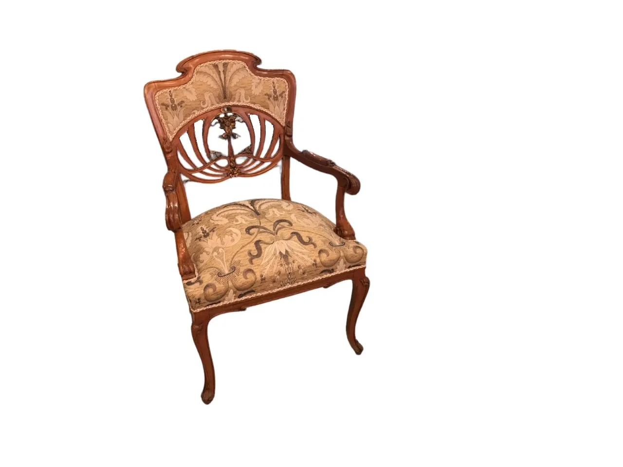 Three elegant antique armchairs in art nouveau style with intricate details and a cozy setting.