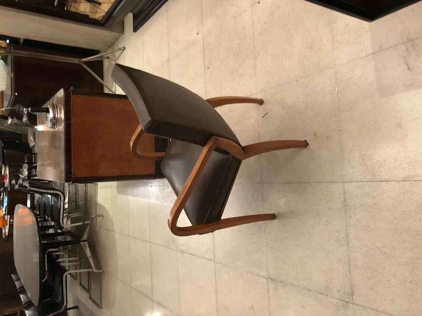 Antique desk chair in a contemporary setting.