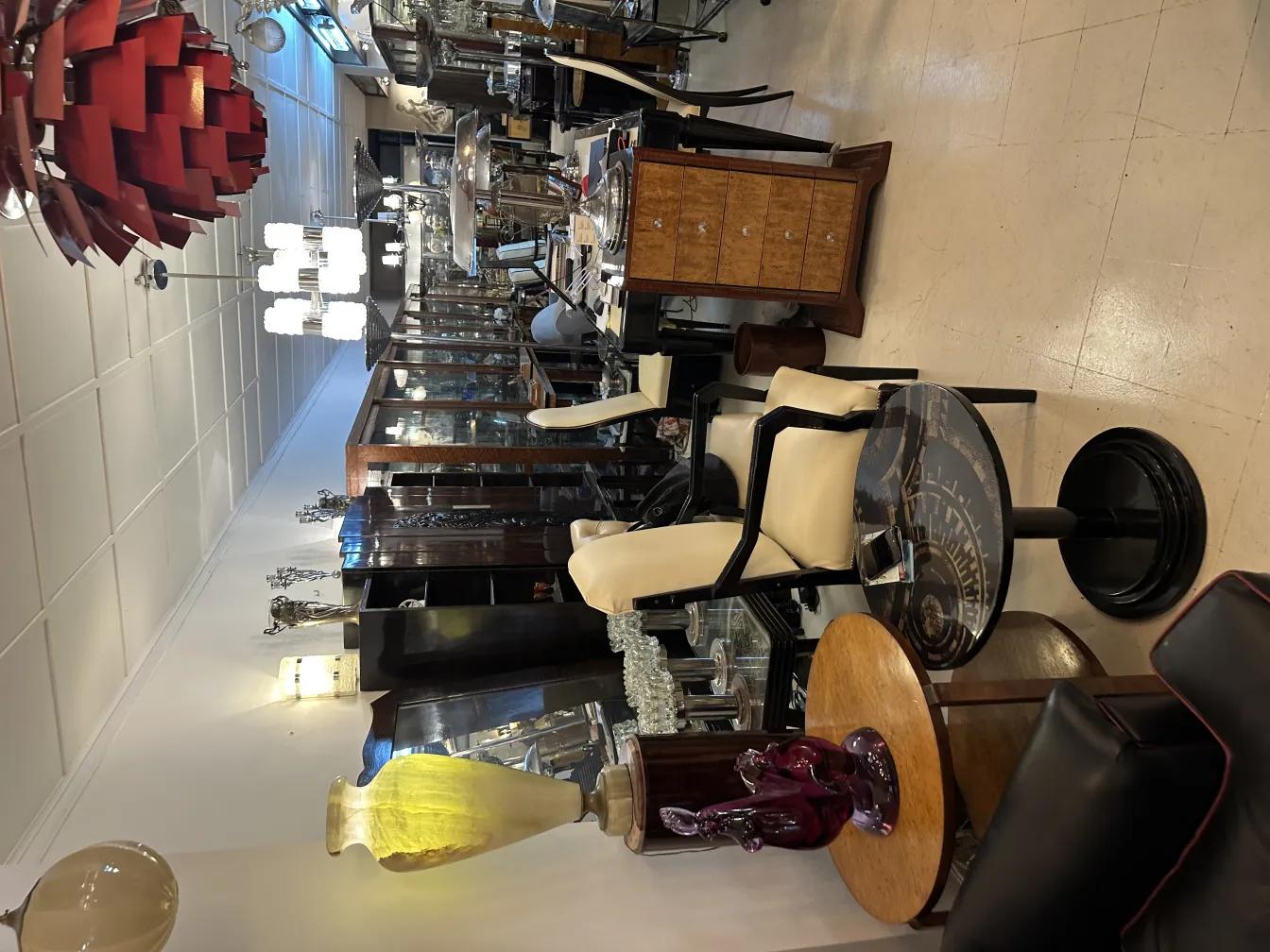 antique desk chair in an elegant setting with various furniture