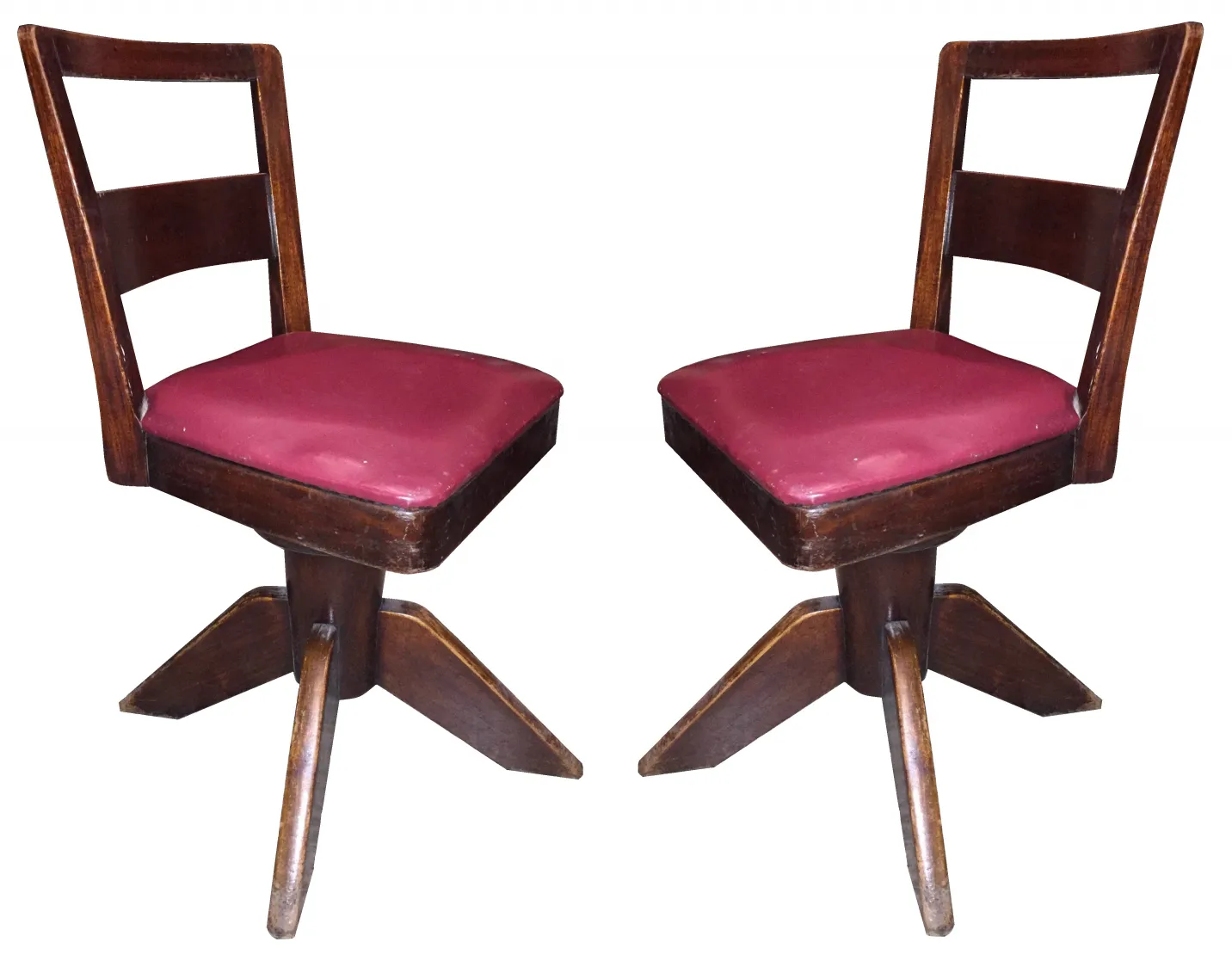 Four antique desk chairs with burgundy seats