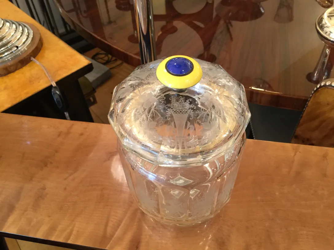 antique glass candy box with yellow and blue lid, featuring a floral pattern