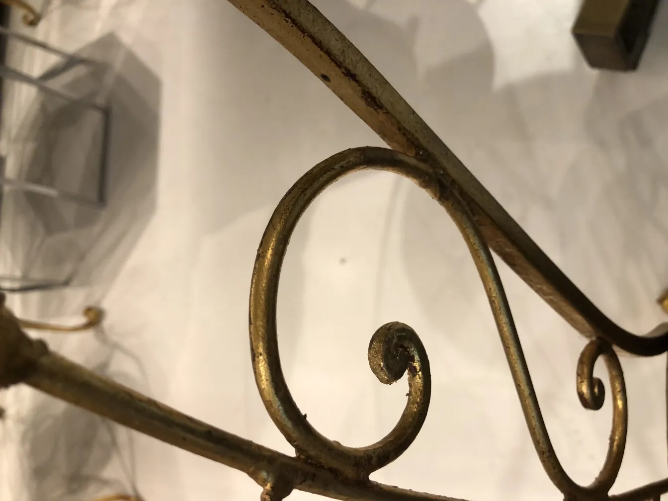 antique chairs with decorative iron details