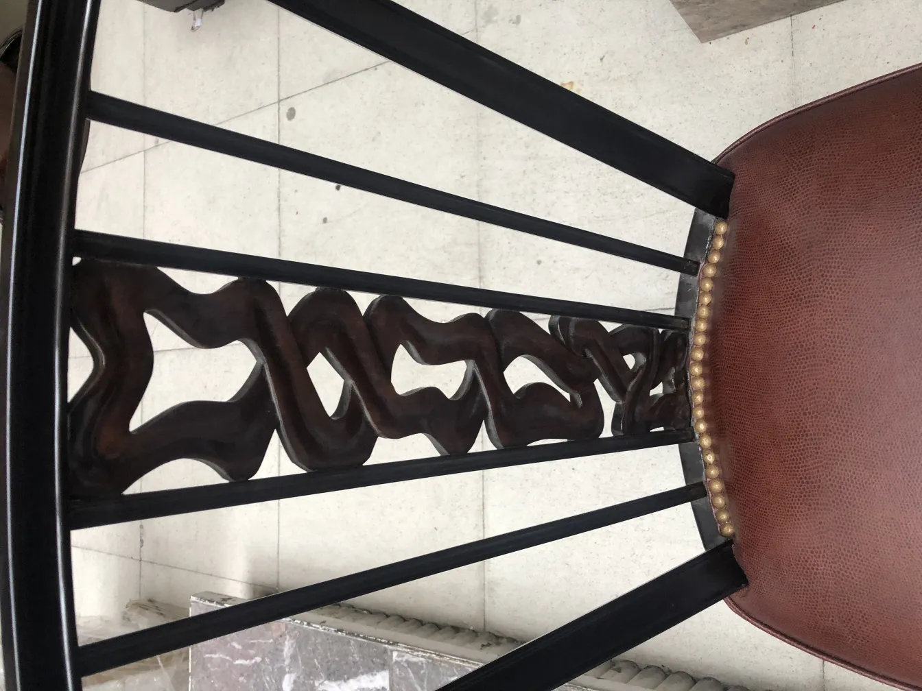 Top view of 2 antique chairs with decorative backrest