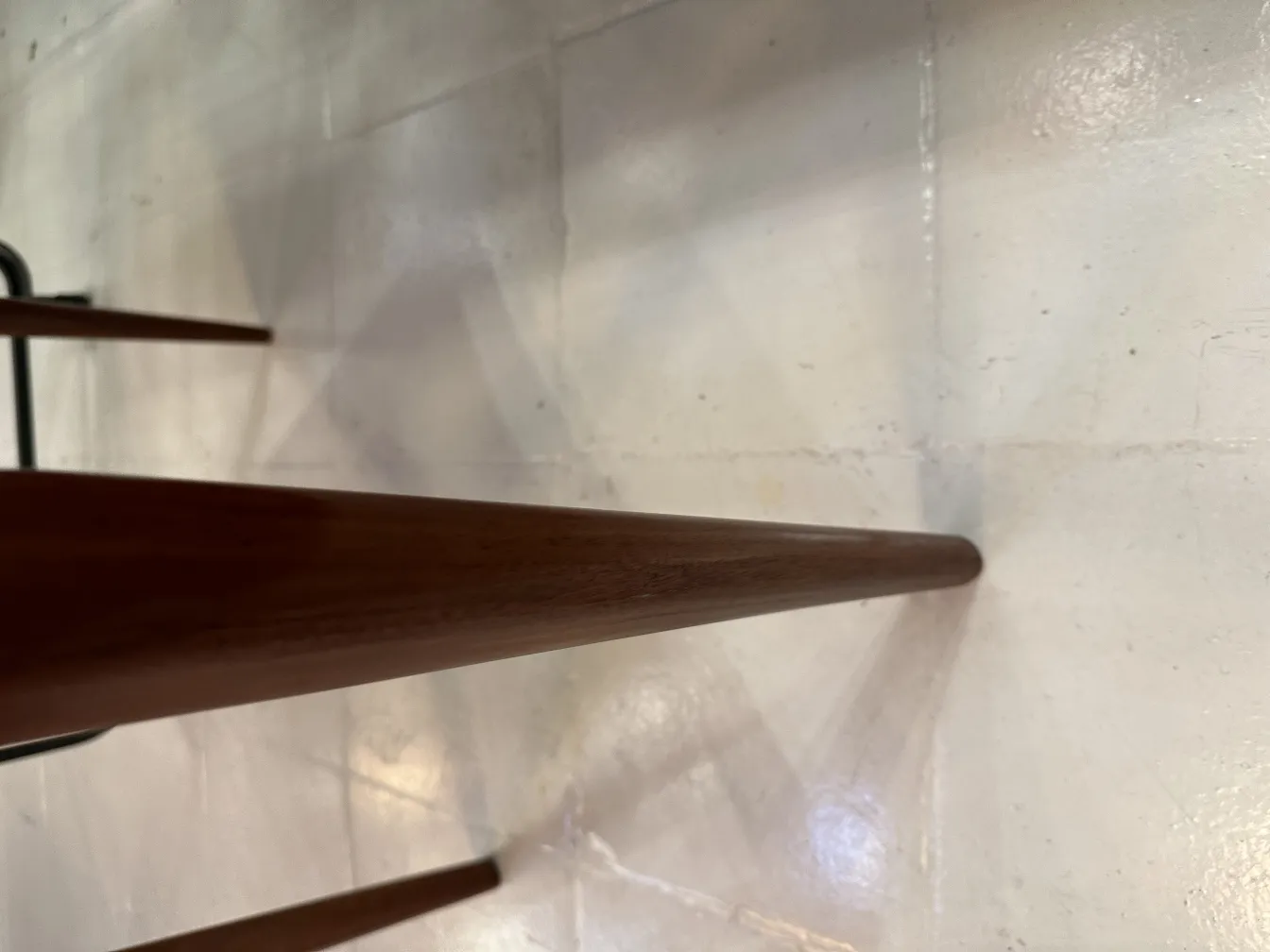 8 antique chairs in various colors against a light background