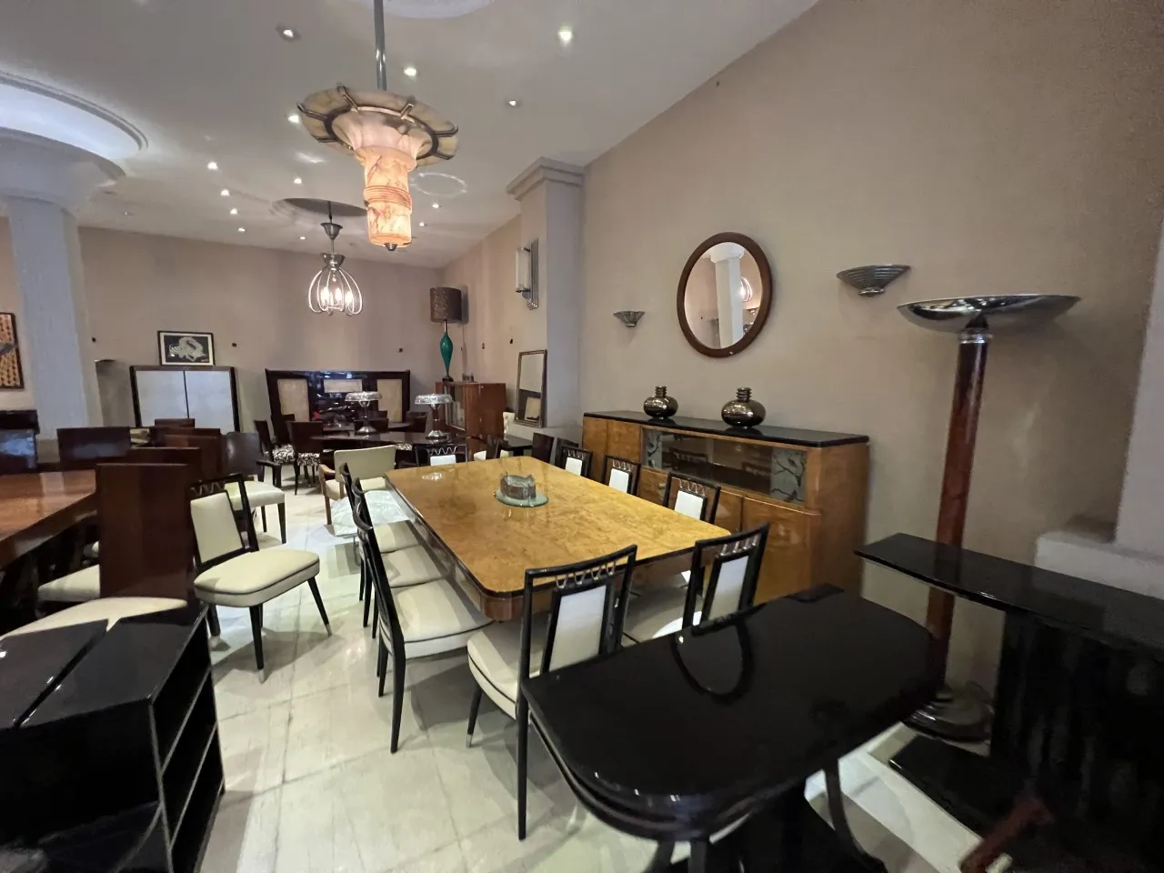 View of 10 antique chairs in an elegant setting