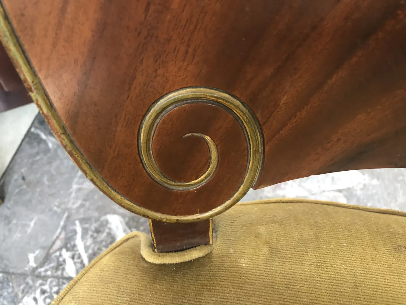 Detail of an antique with relief on antique chairs