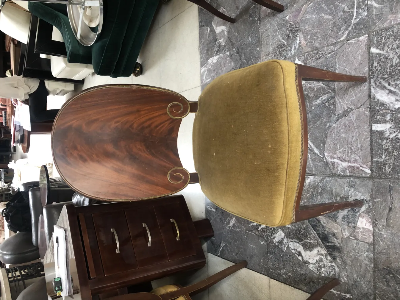 antique chairs with a classic, elegant design in a decorative setting