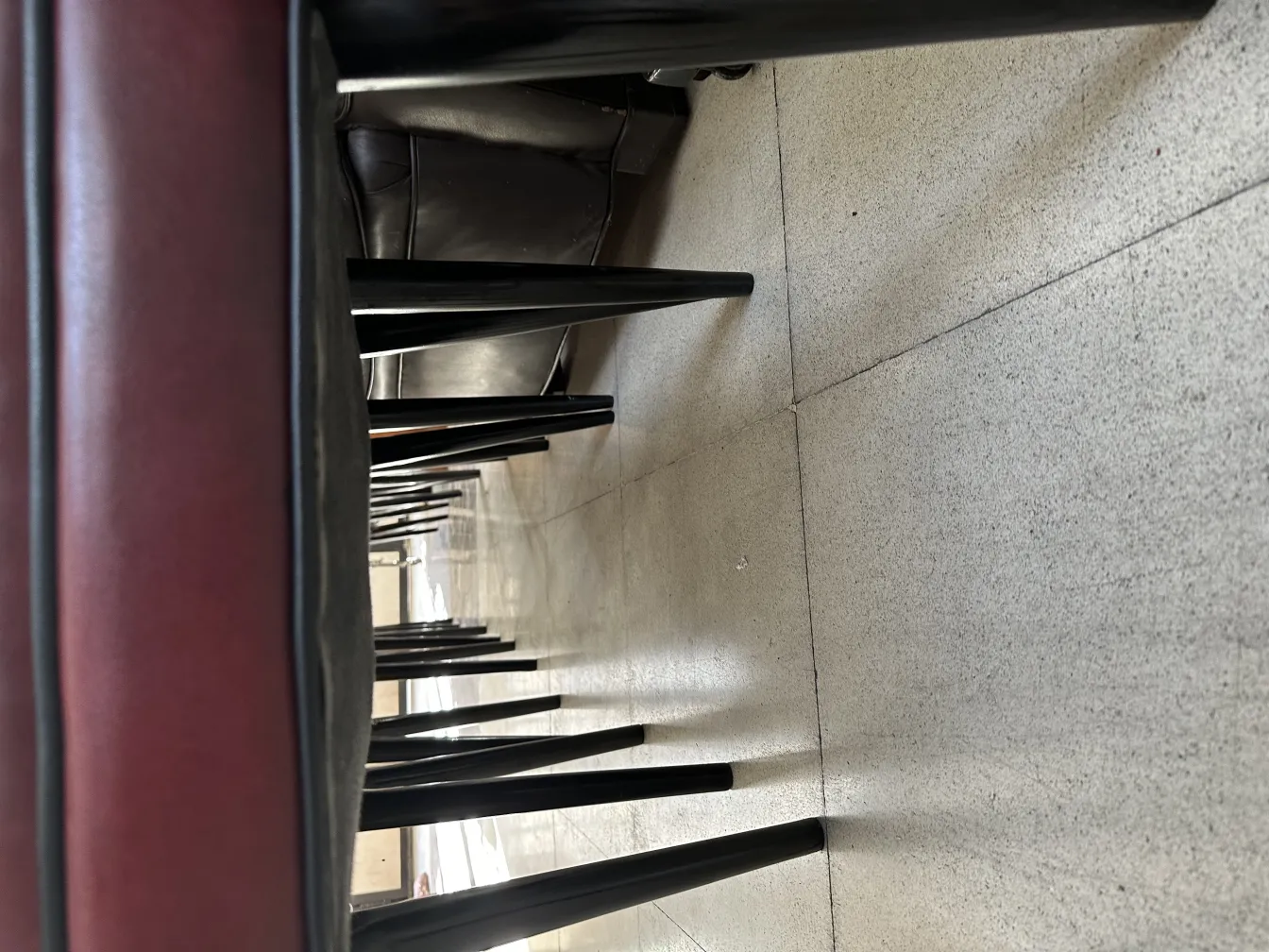 View of 12 antique chairs in an elegant setting