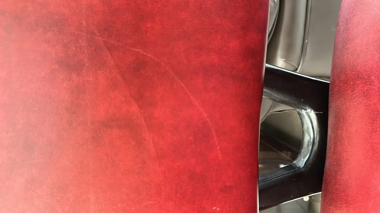 Design of 12 antique red chairs in an elegant setting