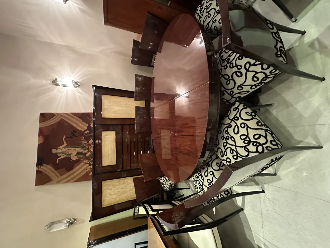 Set of 12 antique chairs in a cozy setting with decorative details