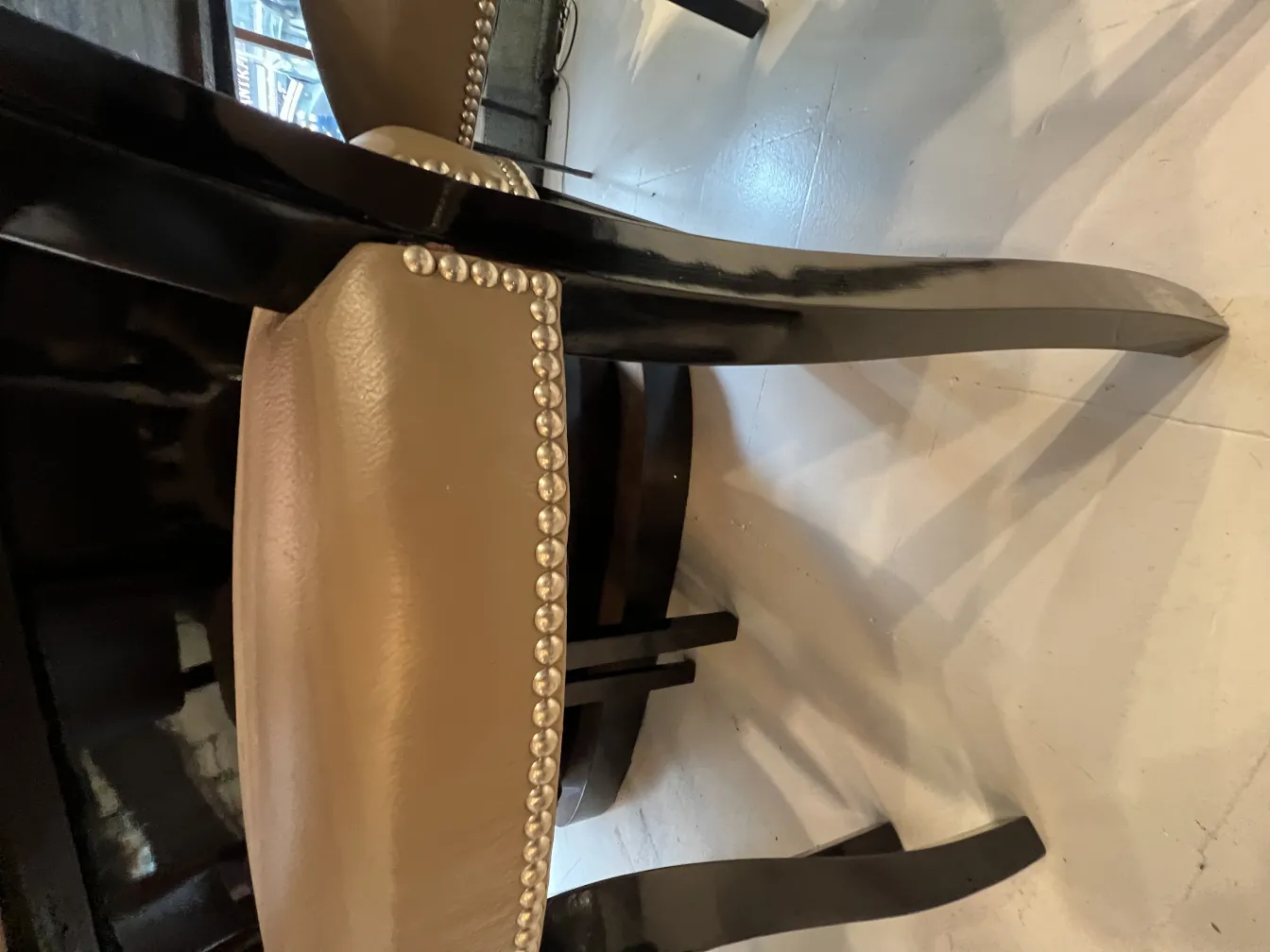 Close view of 12 elegant antique chairs with decorative details