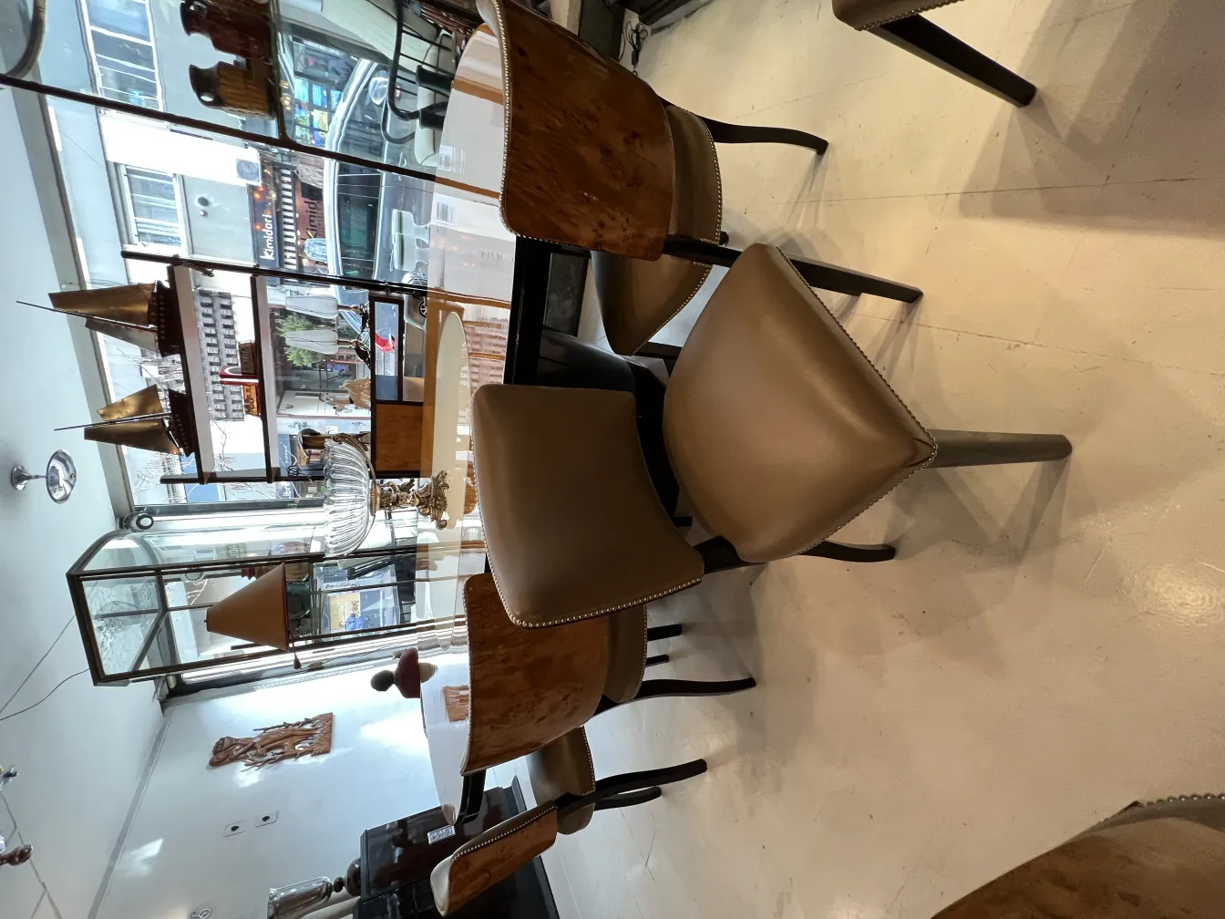 View of 12 antique chairs in an elegant setting