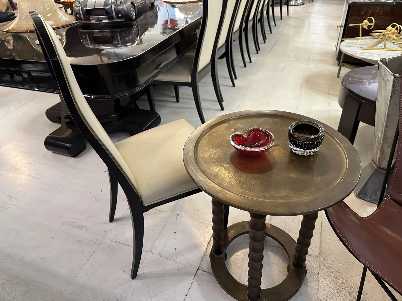 View of 12 antique chairs around an elegant table