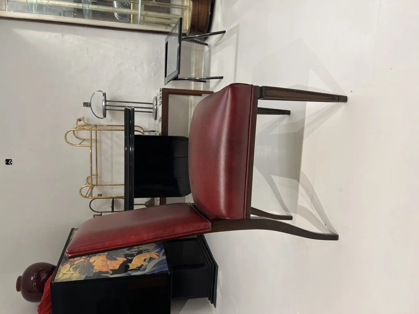 Various antique chairs with a design in an elegant environment