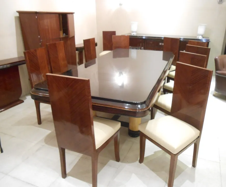 12 antique wooden chairs with elegant design in a dining space