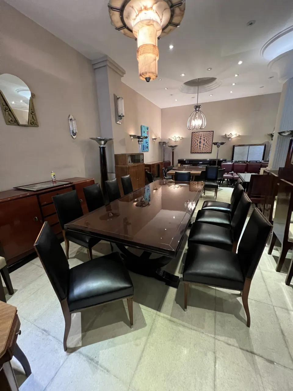 Set of 12 antique chairs in an elegant dining room