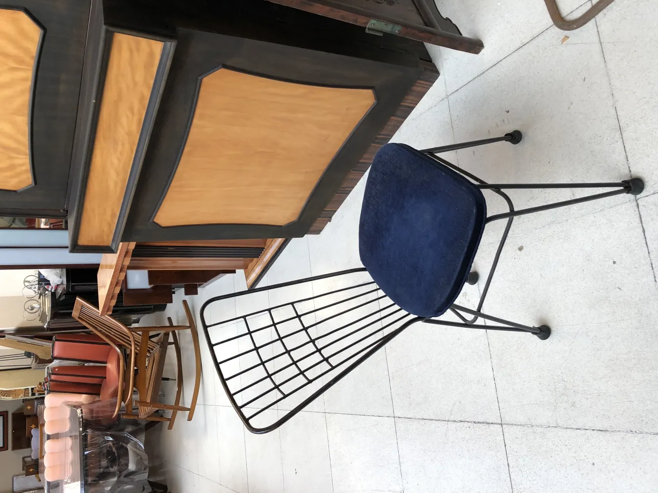 antique blue chair in a mixed environment