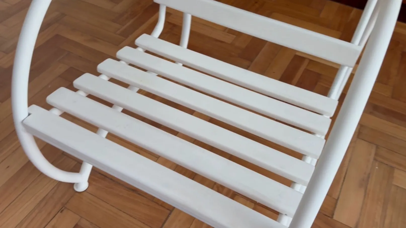 Antique white garden armchairs, perfect for outdoor settings