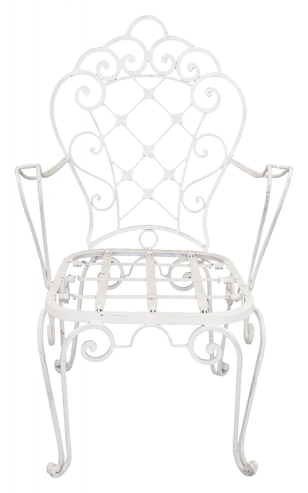 Two antique garden armchairs with ornate design in an outdoor setting