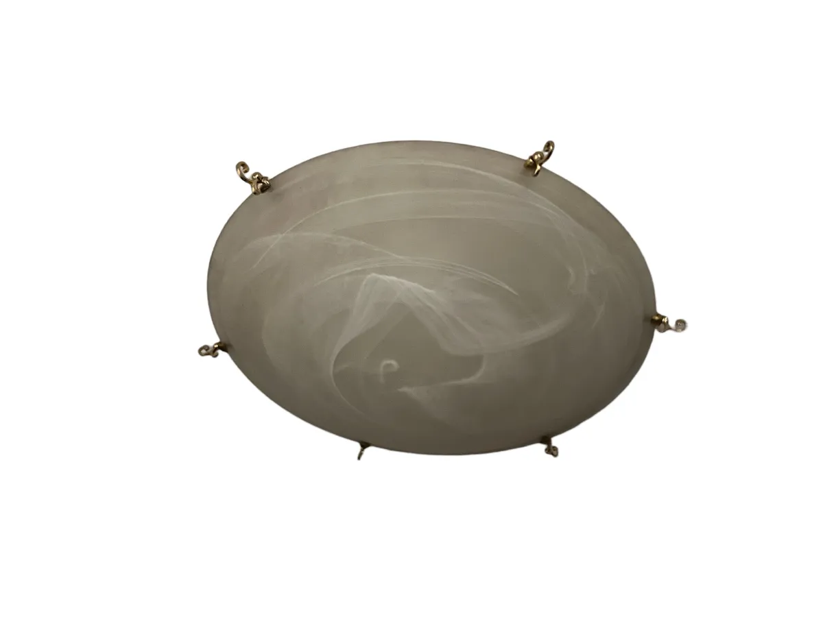 Four antique ceiling lights in a circular design with delicate details.