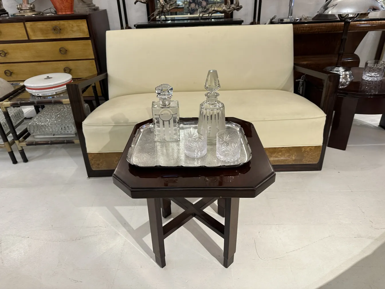 antique serving tray on a table with bottles