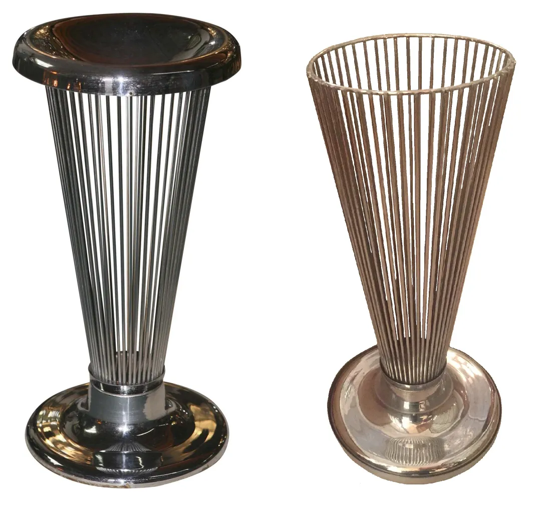 antique umbrella stand in cylindrical shape with shiny rods, in a modern setting