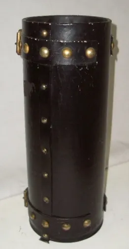 antique cylindrical umbrella stand with brass accents