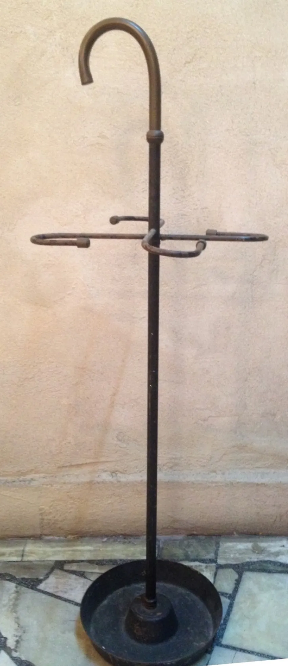 Vintage decorative umbrella stand with round base and hooks