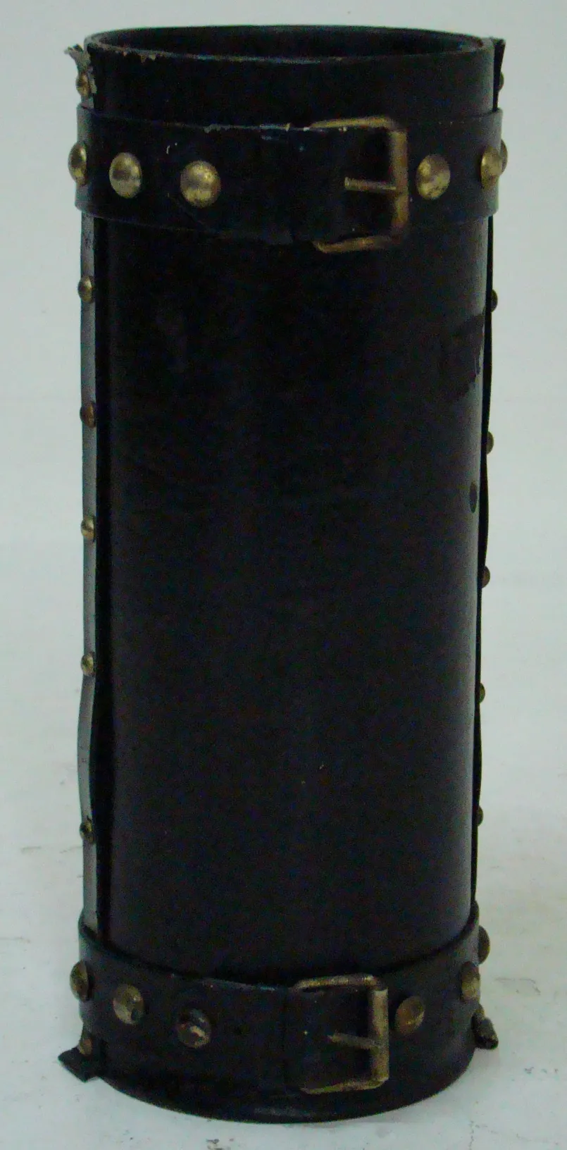 antique umbrella stand with decorative details and elegant design