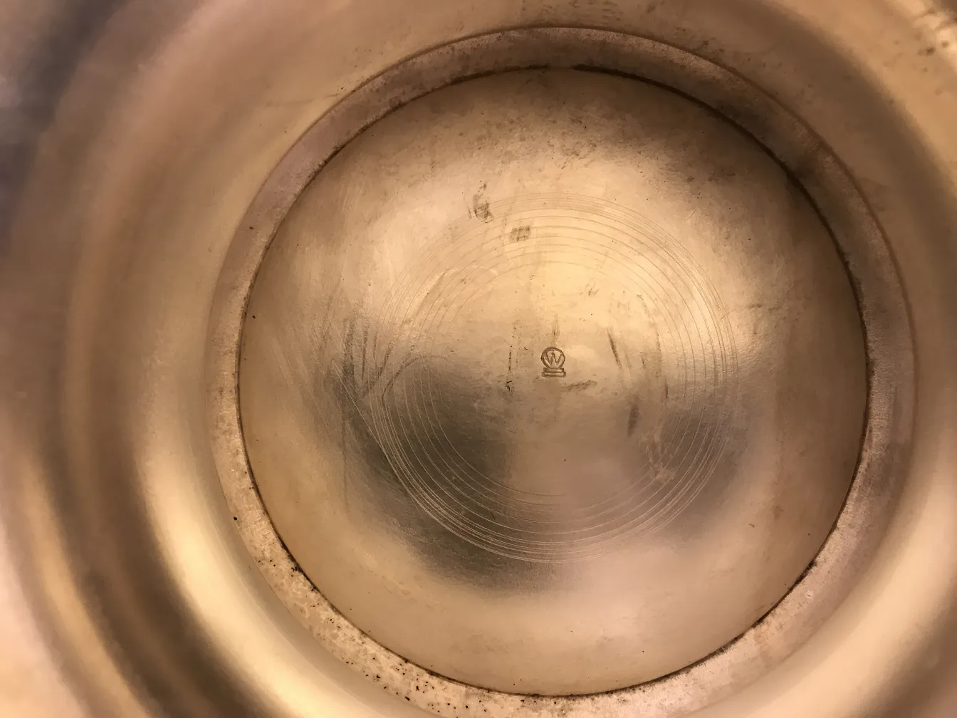 Inside of an antique umbrella stand with elegant details and distinctive design