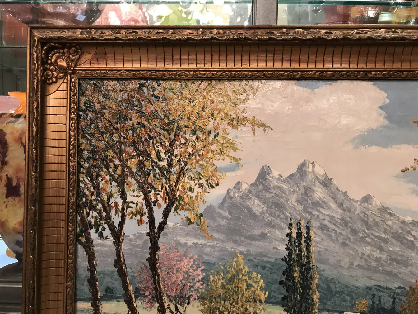 그림 Crispino 나무와 산이 있는 풍경이 그려져 있습니다.