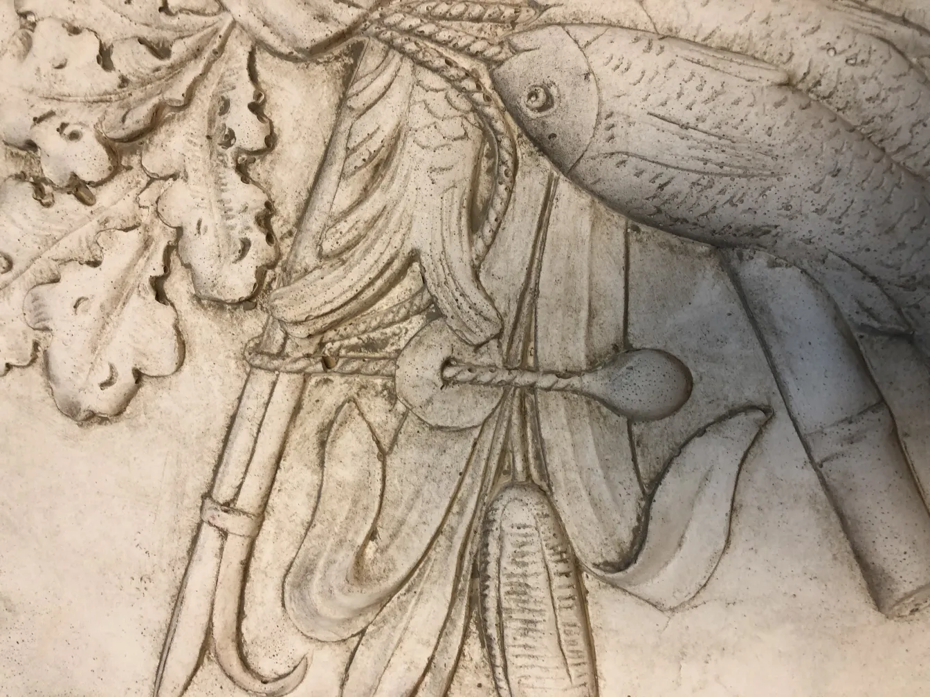 details of an antique wall plate with decorative reliefs