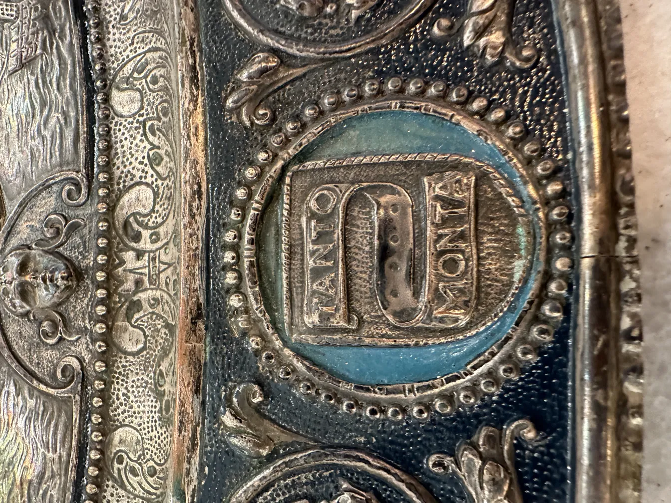 Antique wall plate with carved details and elegant design