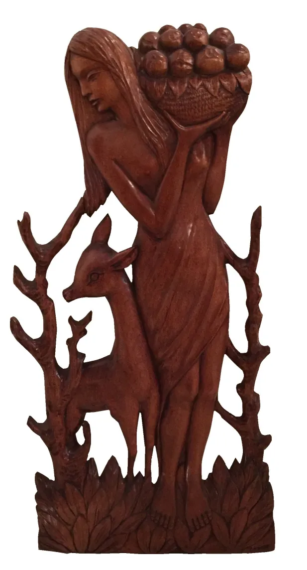 Antique wall plate with carved wooden figure, woman holding a basket.