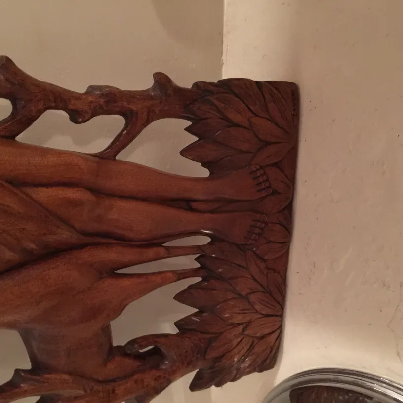 Antique wall plate with intricate design and handcrafted details.