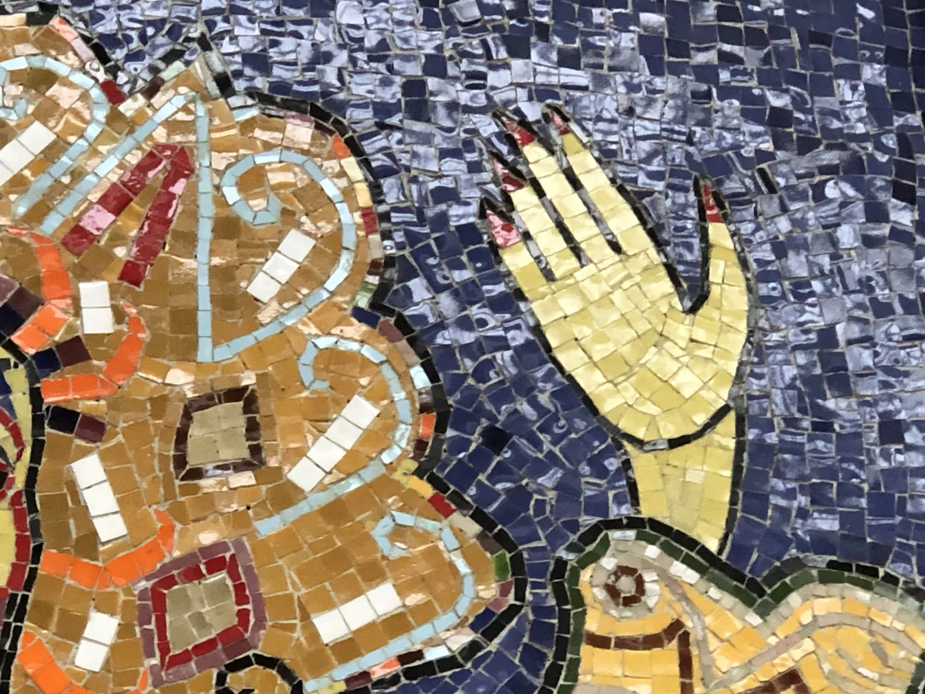 antique mosaic panel featuring vibrant colors and designs