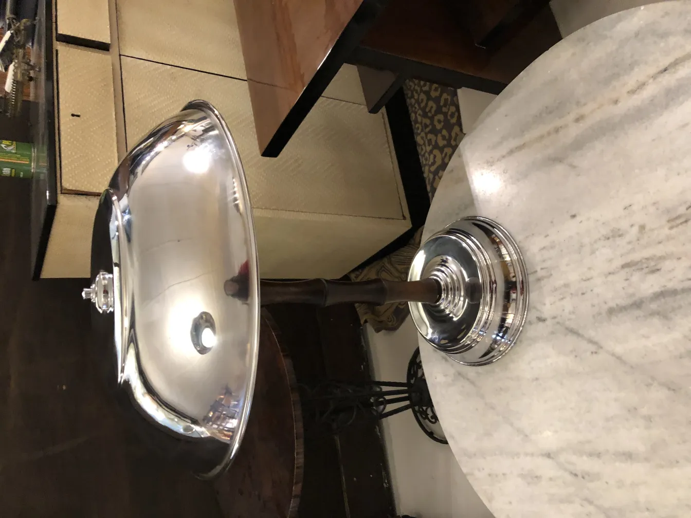 two antique table lamps with an elegant design in a cozy setting