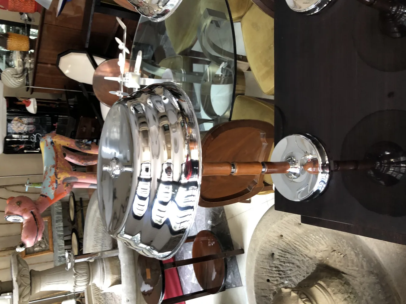 Two antique table lamps with chrome design on a table