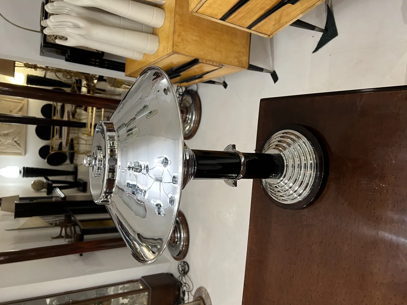 View of 2 antique table lamps with elegant detail in vintage setting