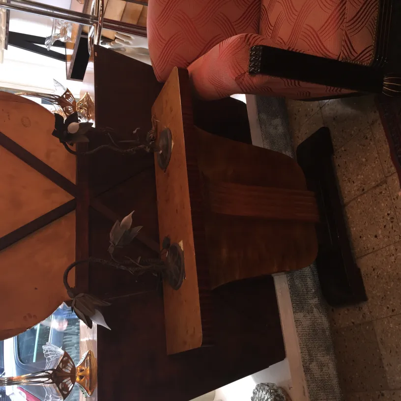 two antique table lamps with decorative floral details