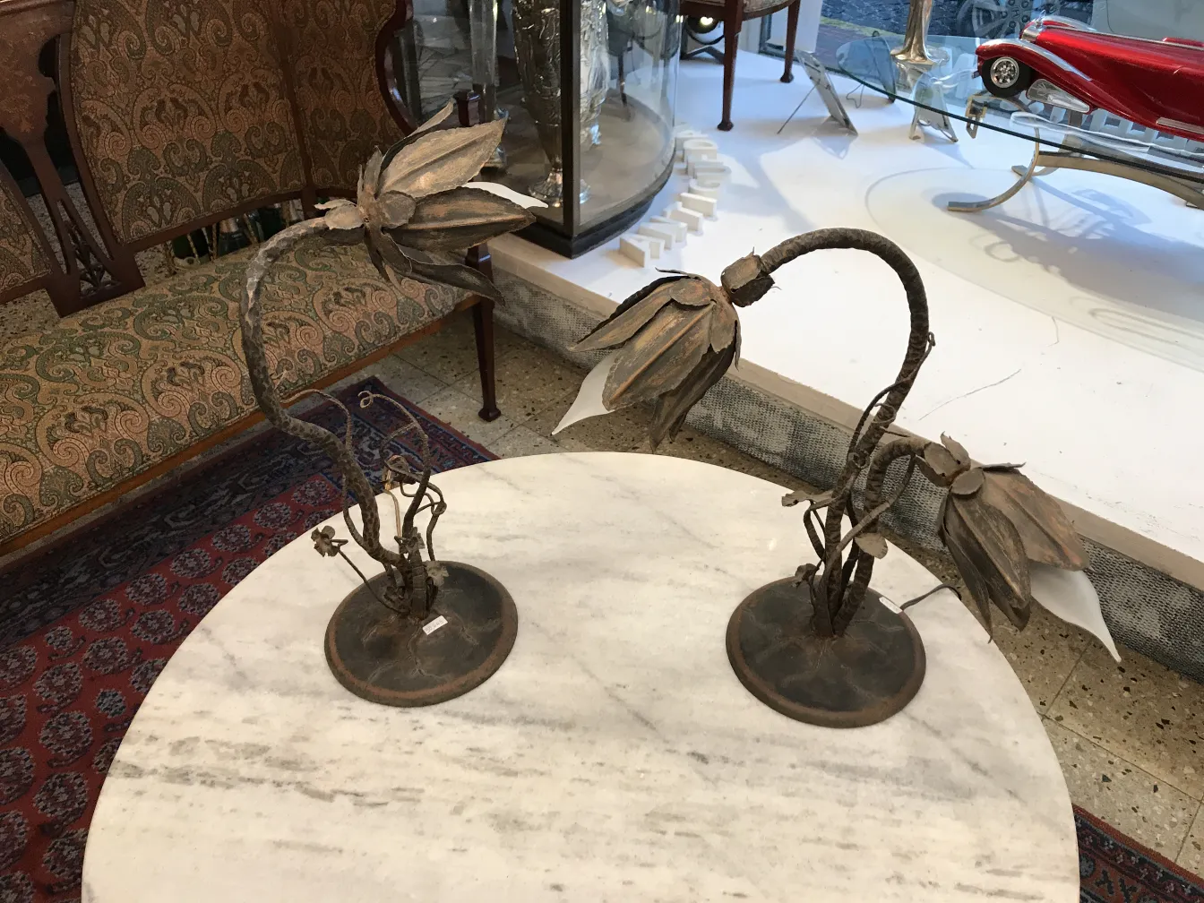 View of 2 antique table lamps with decorative flowers
