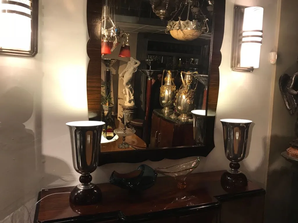 Two elegant antique table lamps with dark base.