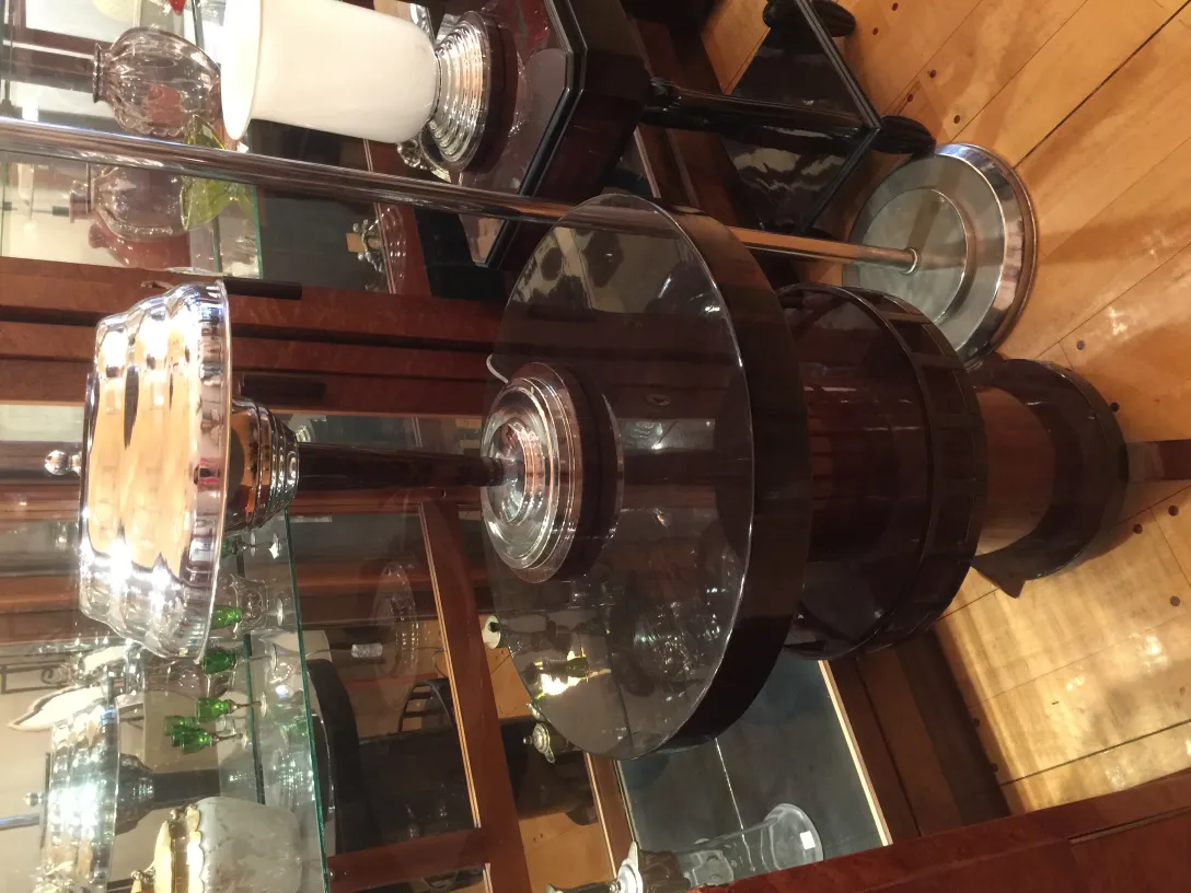 Two antique table lamps showcasing a unique design in a cozy setting.