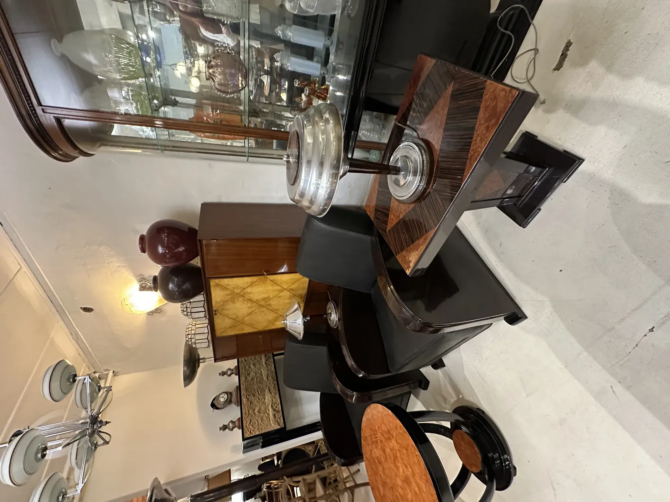 Two antique table lamps in an elegant setting with decor