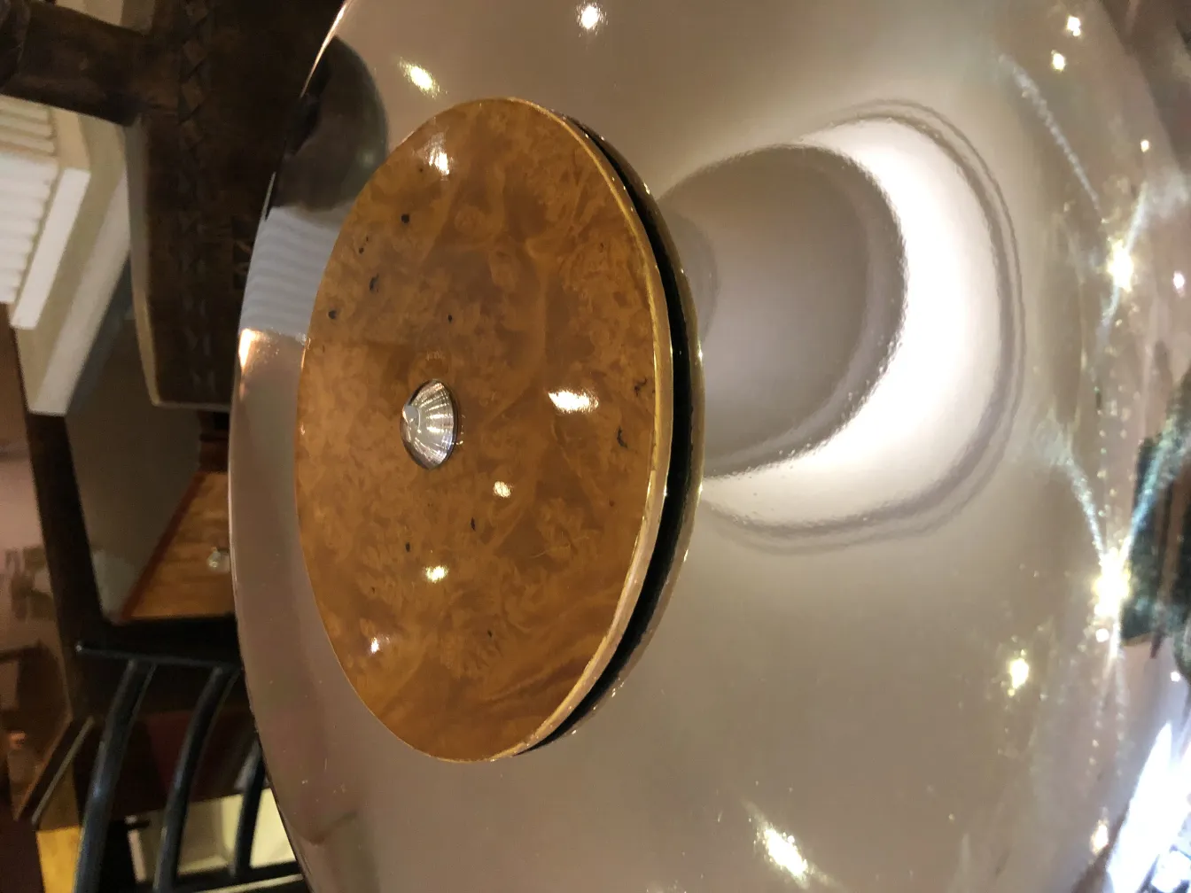 Top view of 2 antique table lamps with decorative details in a classic setting