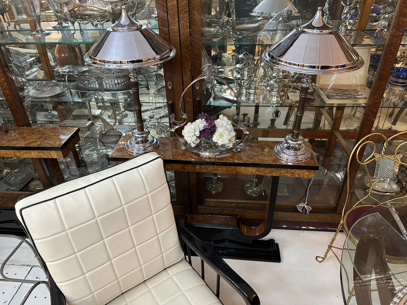 two antique table lamps in an elegant setting