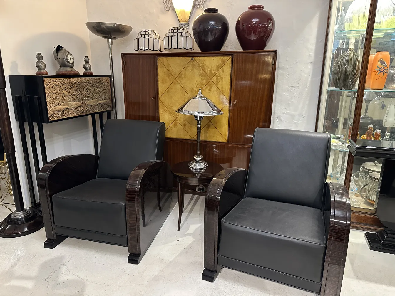 two antique table lamps in an elegant setting