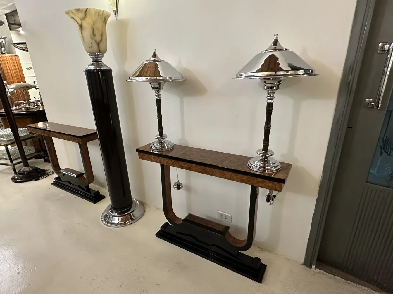 two antique table lamps with distinctive bases
